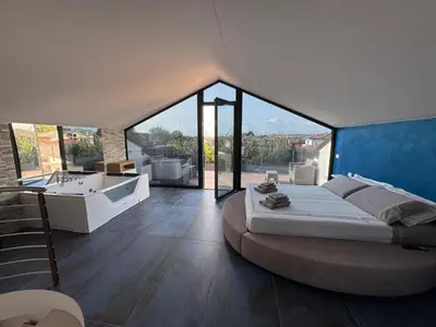 Letto o letti in una camera di Aurora Rooms and Suite