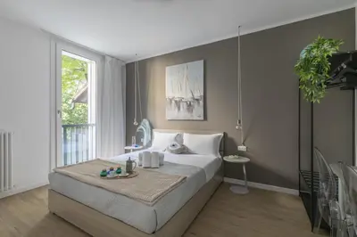 Letto o letti in una camera di Cima Suite 13 by WelcHome