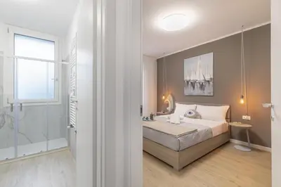 Letto o letti in una camera di Cima Suite 13 by WelcHome