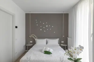 Letto o letti in una camera di Cima Suite 14 by WelcHome