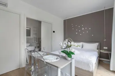 Letto o letti in una camera di Cima Suite 14 by WelcHome