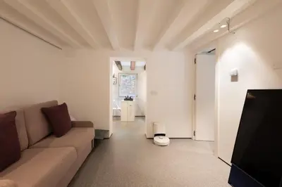 TV o dispositivi per l'intrattenimento presso Private Courtyard Peggy Cozy Venice Apartment