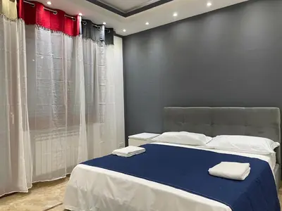 Letto o letti in una camera di Venetian Breeze