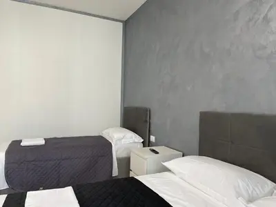 Letto o letti in una camera di Venetian Breeze