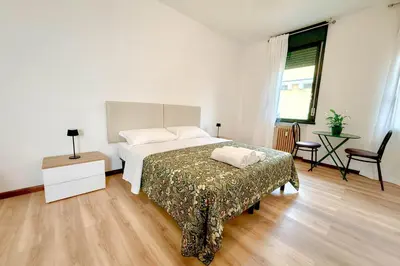 Letto o letti in una camera di Residence Foscolo