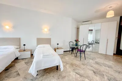 Letto o letti in una camera di Residence Foscolo