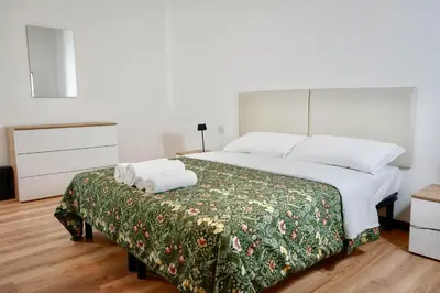 Letto o letti in una camera di Residence Foscolo