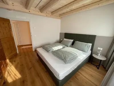Letto o letti in una camera di Agriturismo I Giardini di Ron