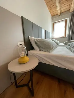 Letto o letti in una camera di Agriturismo I Giardini di Ron