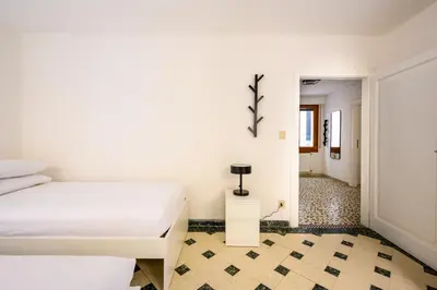 Letto o letti in una camera di Palazzina Pistor 1st Floor by Sarlux