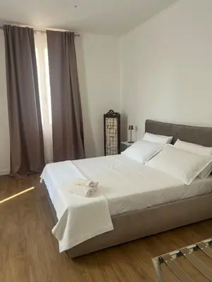 Letto o letti in una camera di Lodge 46 Luxury Apartment