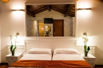 Letto o letti in una camera di Cà Doge
