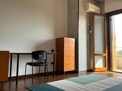 Letto o letti in una camera di Spacious 3 BDR Apartment in Padua