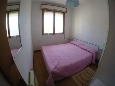 Letto o letti in una camera di Apartment in Rosolina Mare 34551