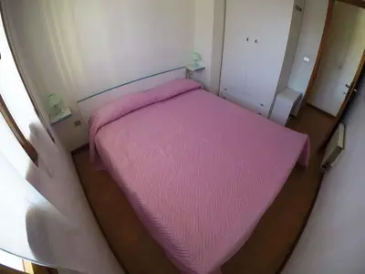 Letto o letti in una camera di Apartment in Rosolina Mare 34551