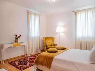Letto o letti in una camera di Casa Fiore Venezia