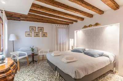 Letto o letti in una camera di Ca' Sartori Venezia