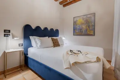 Letto o letti in una camera di Daplace - Antica Casa Coppo