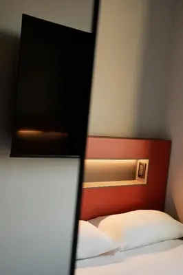 Letto o letti in una camera di Hotello Padova