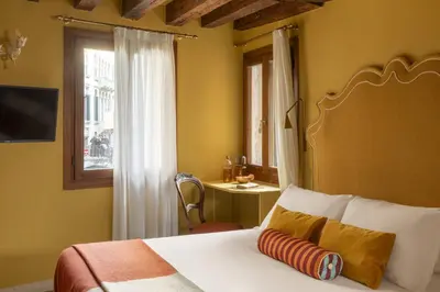 Letto o letti in una camera di Hotel Riva