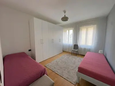 Letto o letti in una camera di Residenza De Gasperi