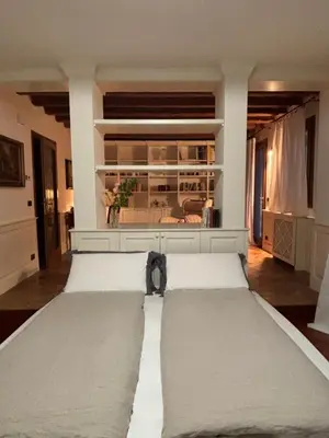 Letto o letti in una camera di La Pisana Relais di Campagna