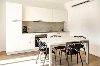 Cucina o angolo cottura di Residence Fornaci - Treviso Modern Apartments Airport