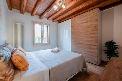 Letto o letti in una camera di Jungle Veranda Colli Berici, con Ristorante