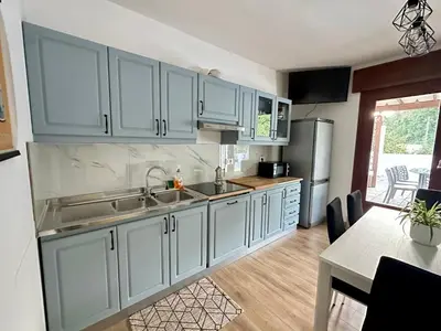 Cucina o angolo cottura di Appartamento Da Deki con ampio terrazzo vista Monte Grappa