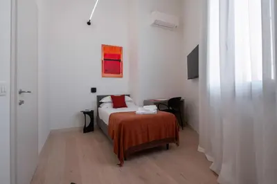 Letto o letti in una camera di Ca' Marcello Maestrale