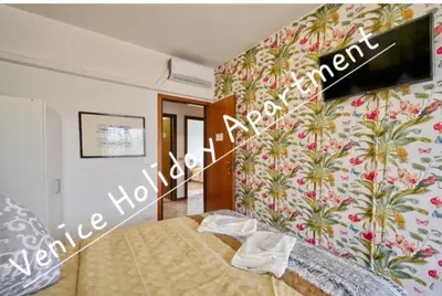 Letto o letti in una camera di Venice Holiday Apartment