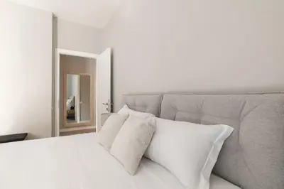 Letto o letti in una camera di Thea Apartment by WelcHome