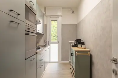 Cucina o angolo cottura di Thea Apartment by WelcHome