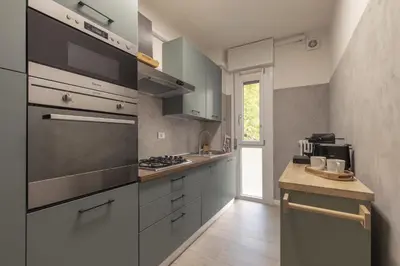 Cucina o angolo cottura di Thea Apartment by WelcHome
