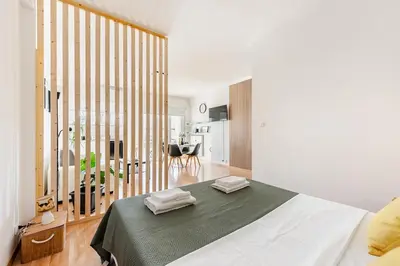 Letto o letti in una camera di Modern Studio 10 min to Venice