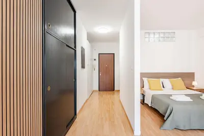 Letto o letti in una camera di Modern Studio 10 min to Venice