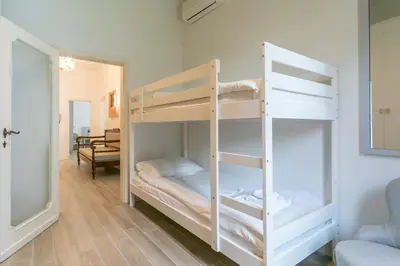 Letto o letti in una camera di Ca' Ramandolo Garden Apartment