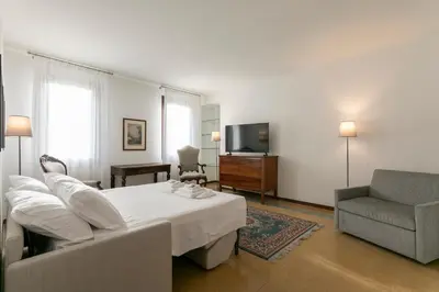 TV o dispositivi per l'intrattenimento presso Ca' Ramandolo Terrace Apartment