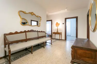 Letto o letti in una camera di Ca' Ramandolo Terrace Apartment