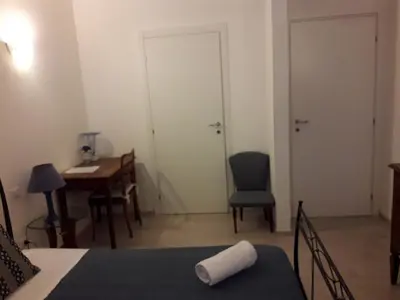 Letto o letti in una camera di Dafne B&B