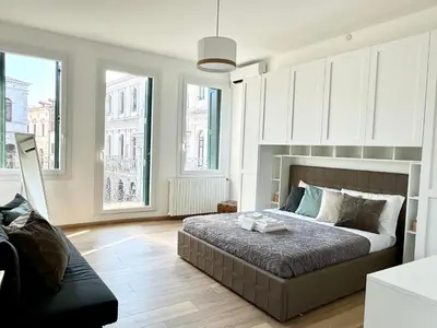 Letto o letti in una camera di La Meridiana - Grande e moderno con vista stupenda