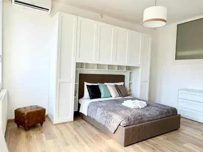 Letto o letti in una camera di La Meridiana - Grande e moderno con vista stupenda