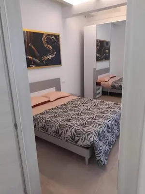 Letto o letti in una camera di La Tavernetta delle Terme Euganee da Mauro e Rosi