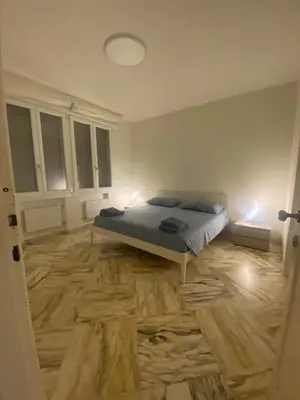 Letto o letti in una camera di Appartamento laguna