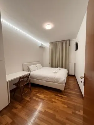 Letto o letti in una camera di Acqueria Residence