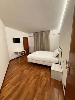 Letto o letti in una camera di Acqueria Residence