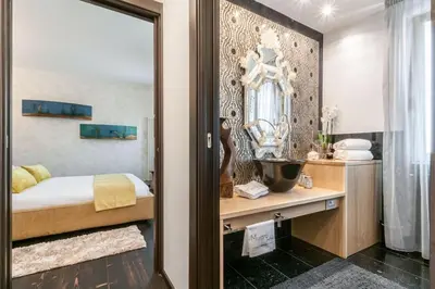 Letto o letti in una camera di Les Suites BOUTIQUE by Sleep in MURANO