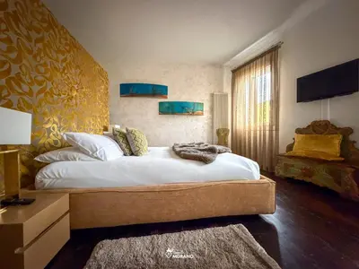 Letto o letti in una camera di Les Suites BOUTIQUE by Sleep in MURANO
