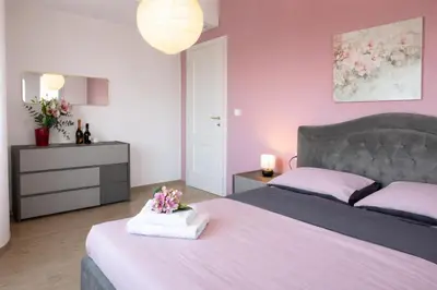 Letto o letti in una camera di Casa Tintoretto Private Free Parking Venice 15'