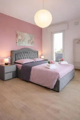 Letto o letti in una camera di Casa Tintoretto Private Free Parking Venice 15'